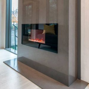 Chimenea y estufa electrica revestida de neolith Steel Marengo marmoleria portaro rosario